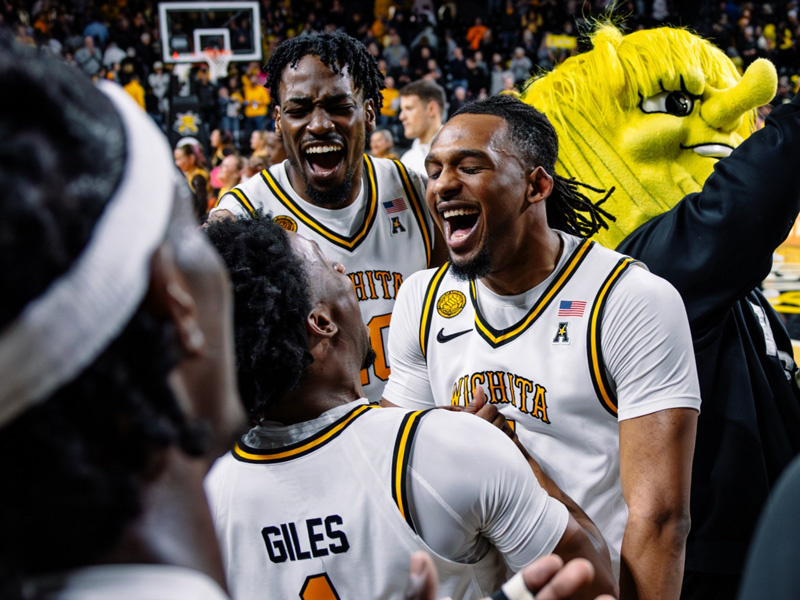 WSU Basketball players celebrating