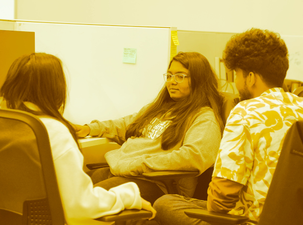 AI R&D Team discussing within the group.