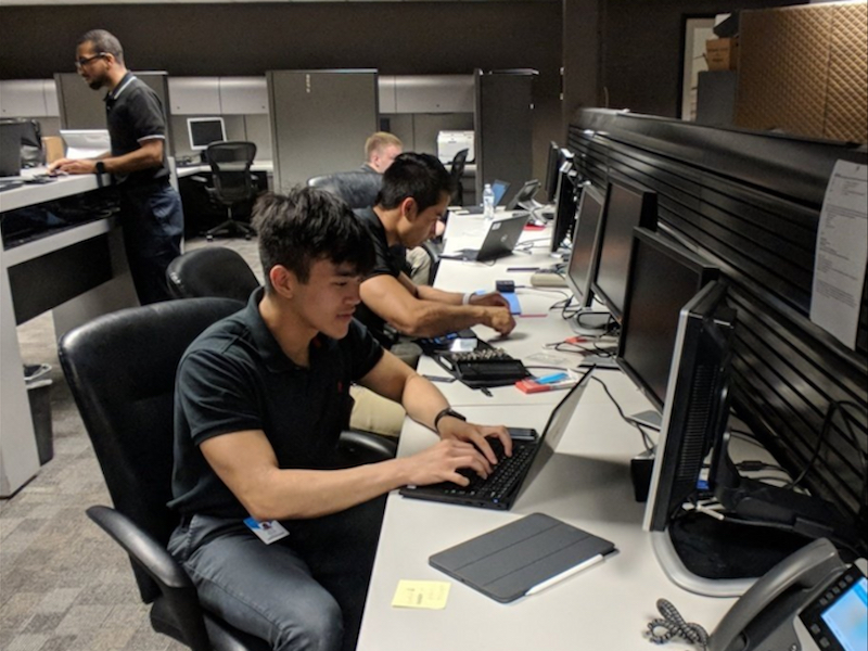 Students performing online Tech Support duties. 