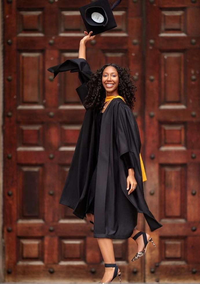 Photo of Chanzi Caesar in a graduation gown