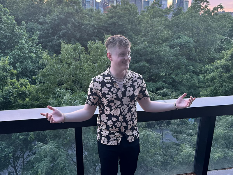 Photo of Davis Willenborg on balcony