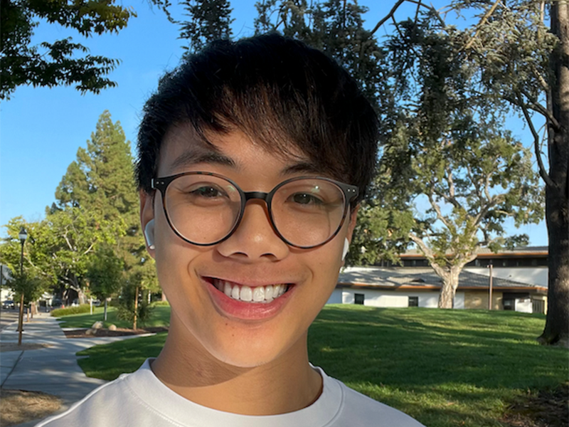 Photo of Kevin Le in a park.