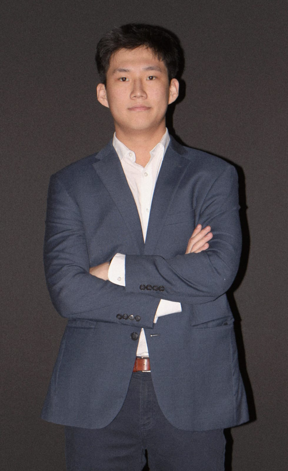 Photo of Binh Lam in a suit.