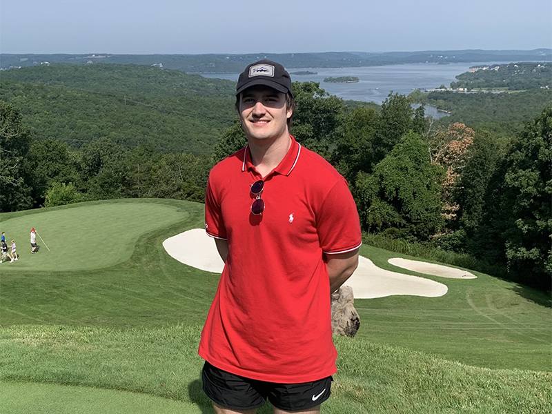 Photo of Peyton Henry golfing