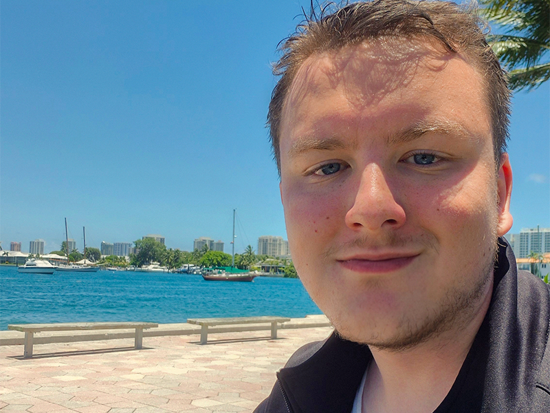 Photo of James Wood at a pier.