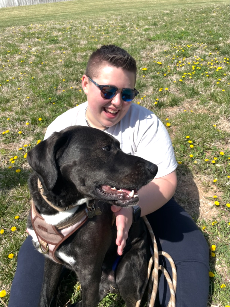 Photo of Sophia Hunt with their dog.
