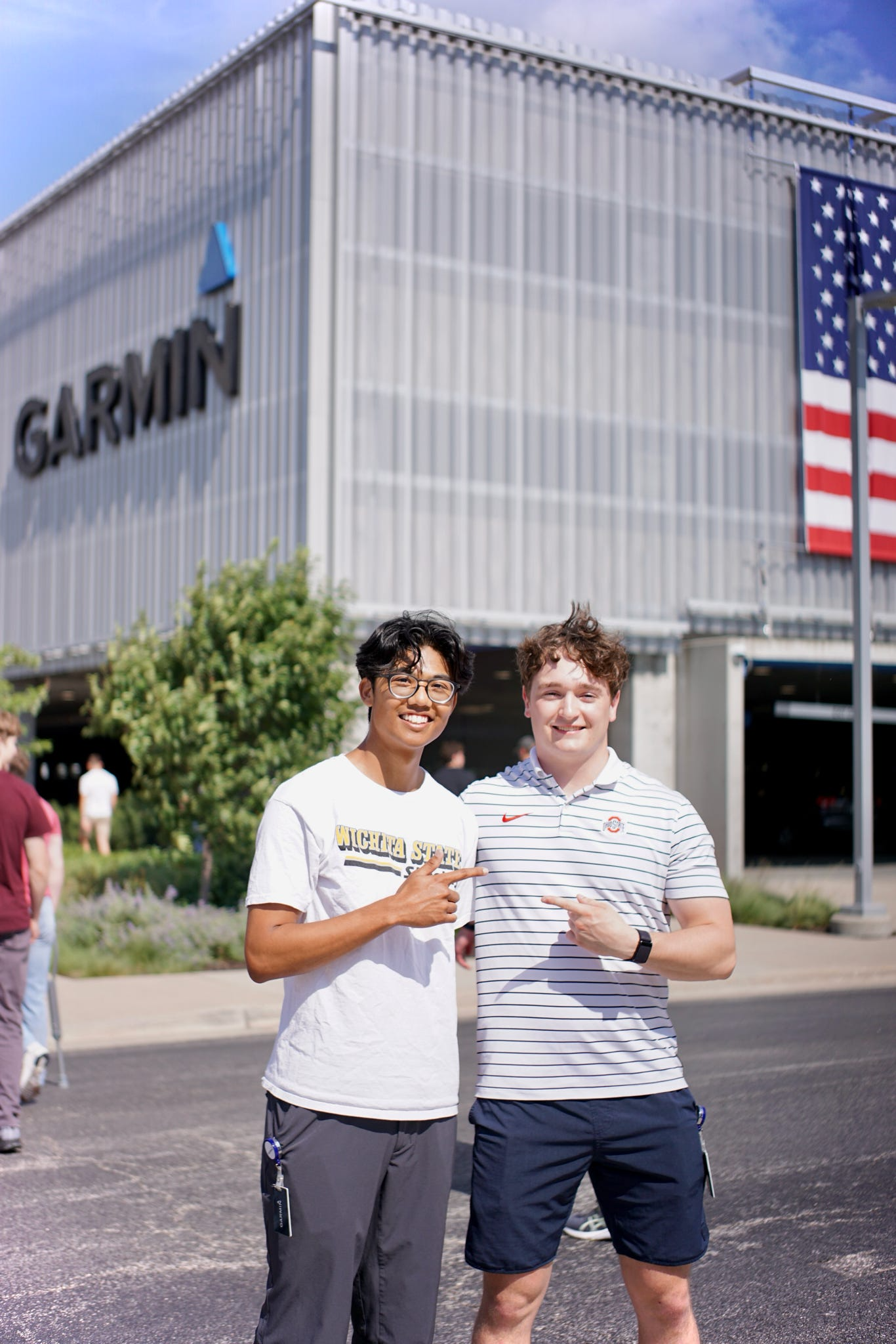 Photo of Austin Antony and one other outside of the Garmin building.