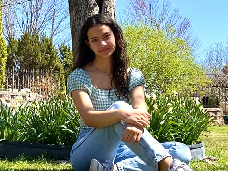 Photo of Alexis Seif sitting outside