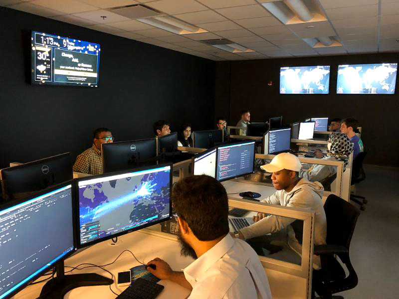 people working in a computer room