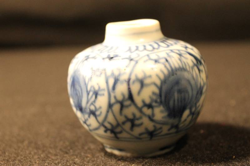 Annamese ceramic with blue and white bulbous-shaped jar. Stylized peacock feather eye pattern.
