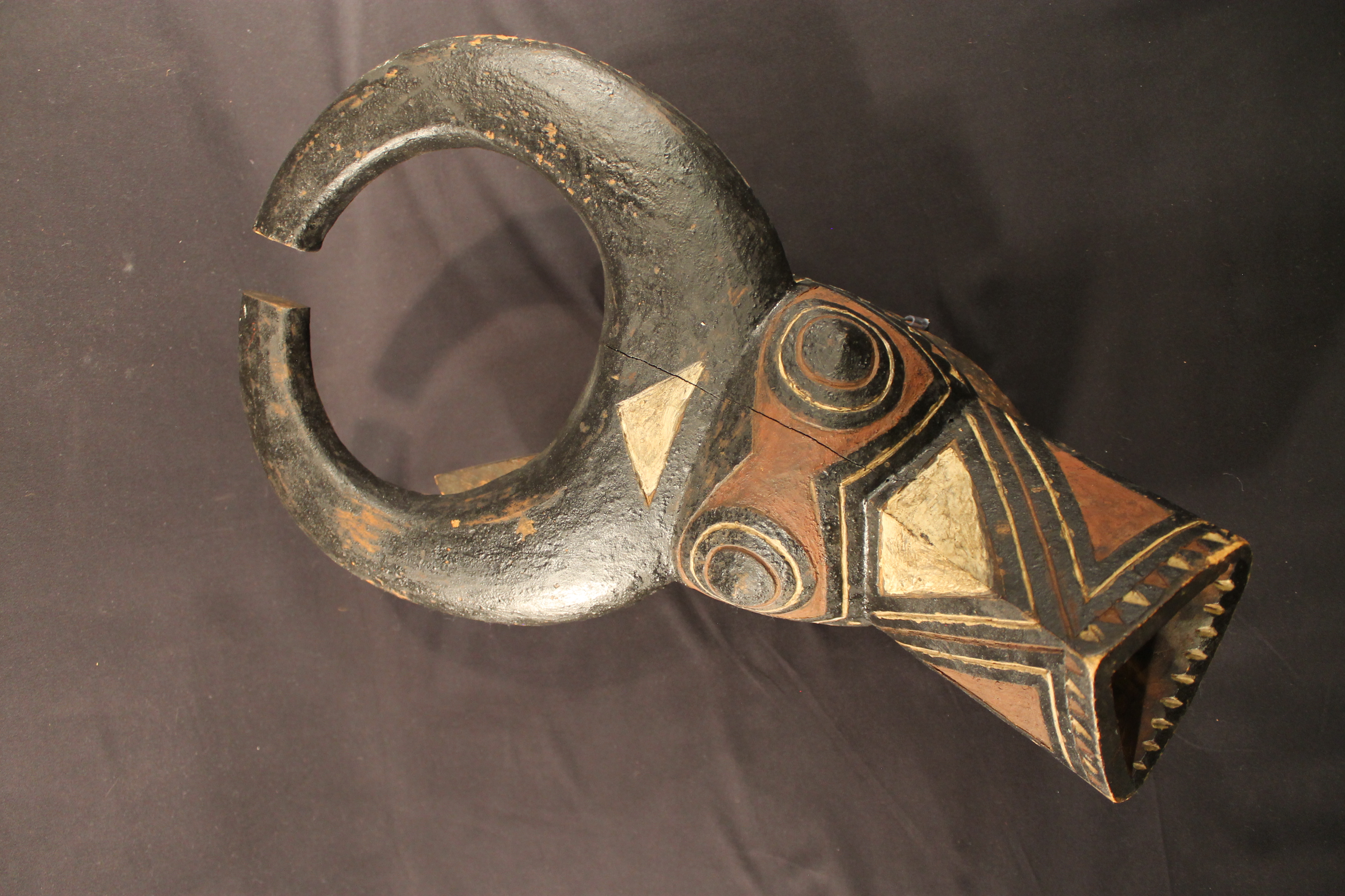  Wood mask in the form of a bush buffalo.