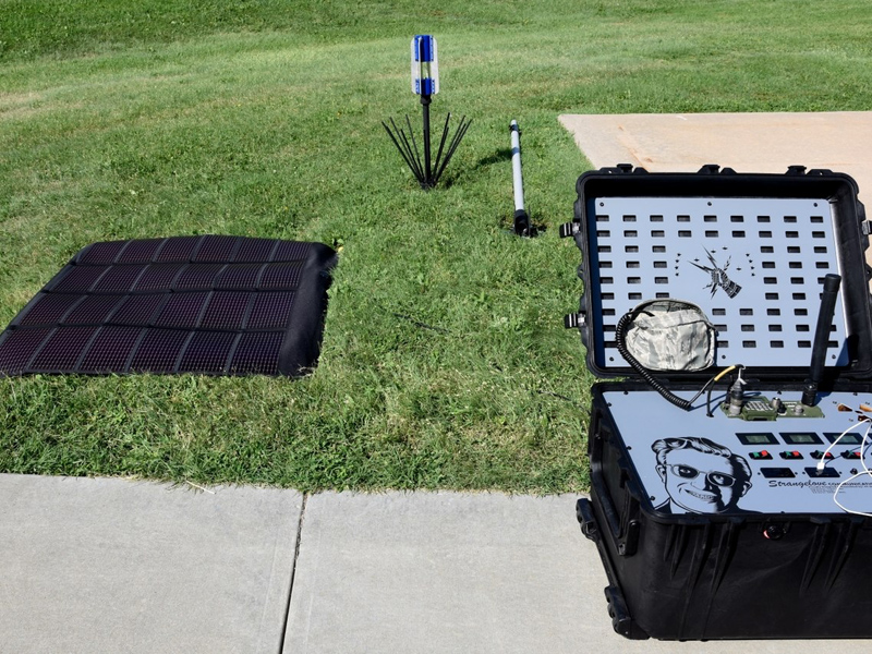 radio equipment and solar panel on grass