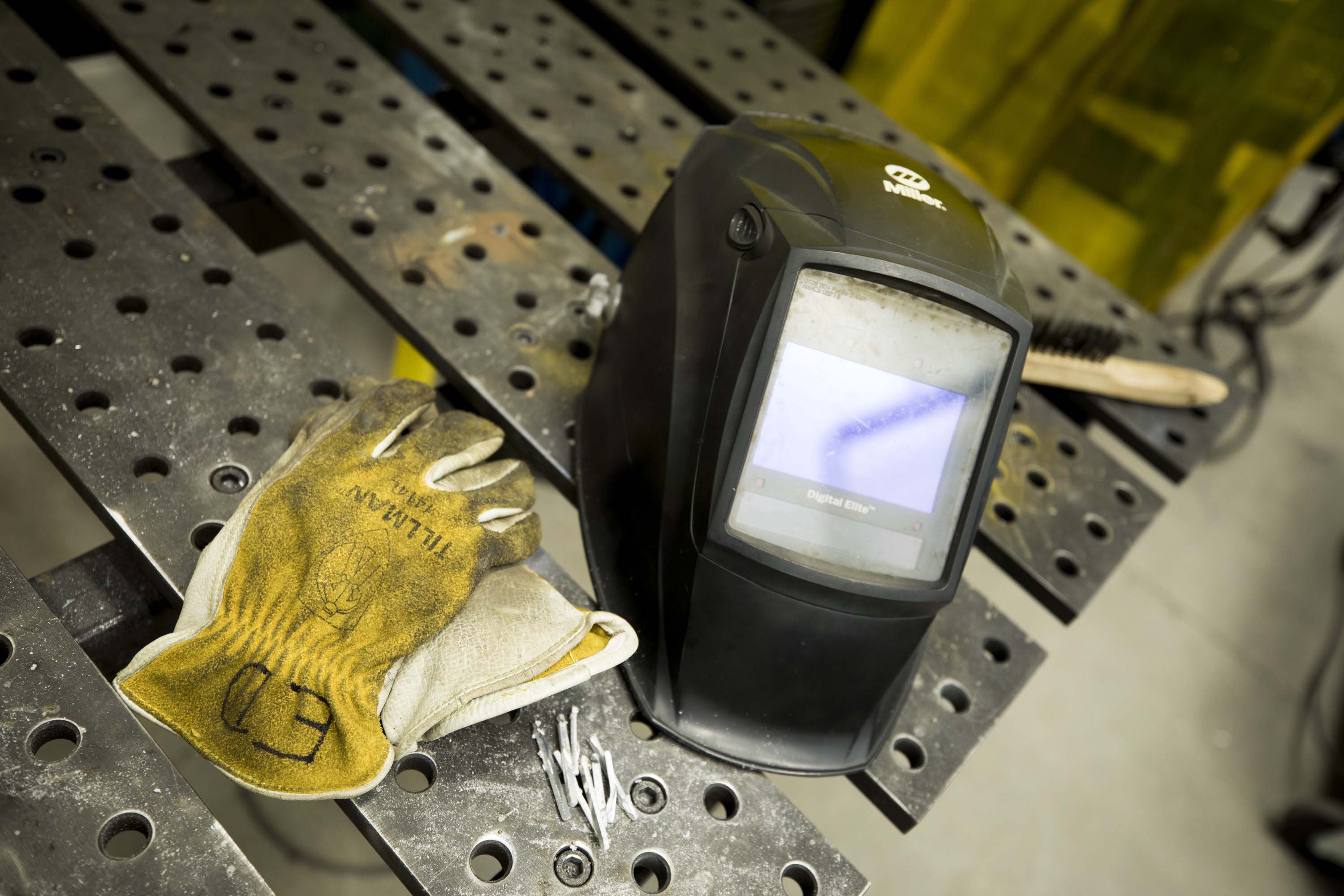 safety gloves and welding helmet