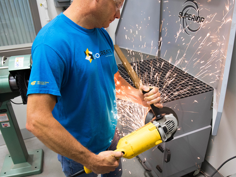 member working on metal project