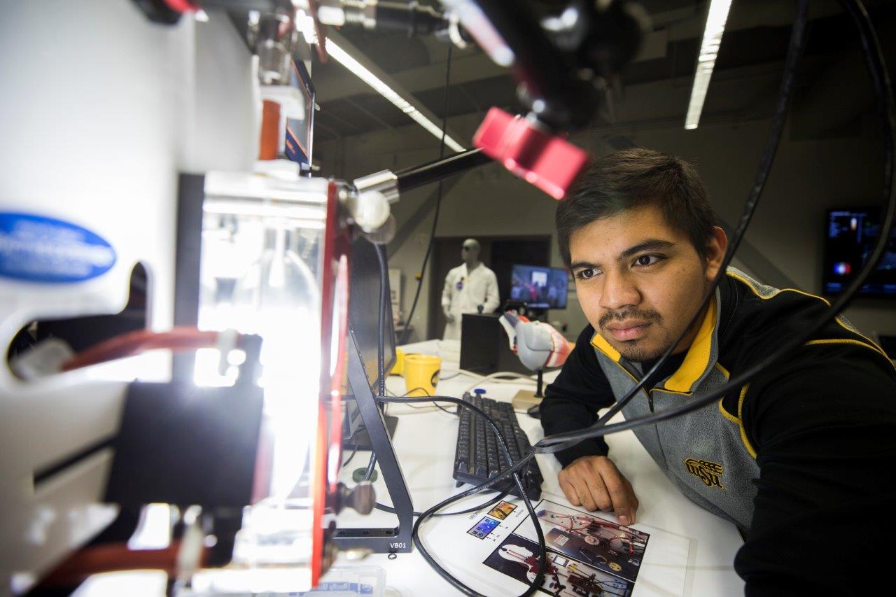 Student studying biofluid dynamics in heart chambers using a PIV system. 