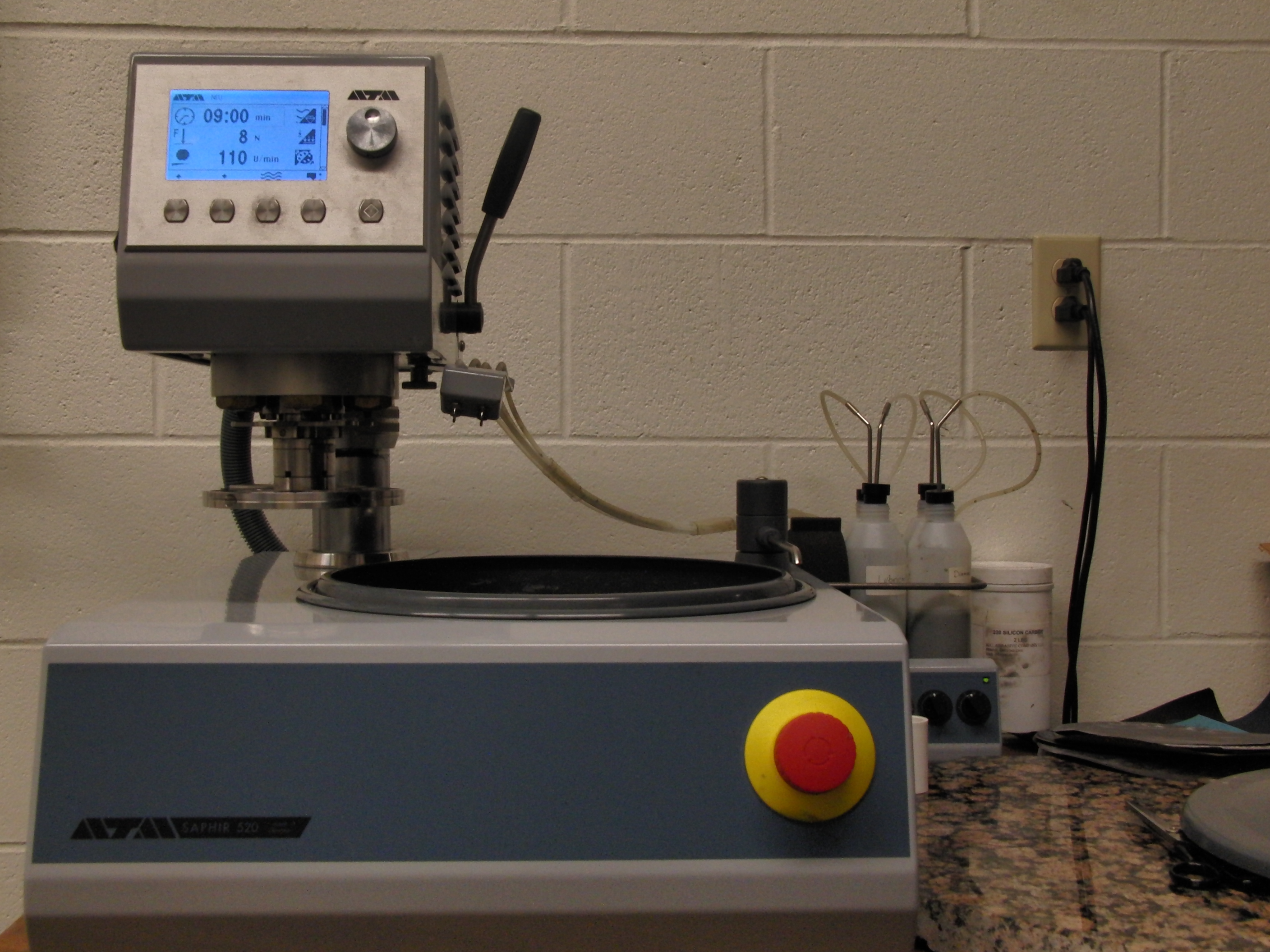 Saphir 520 single wheel grinder and polisher with top-mounted grinding and polishing head Rubin 500