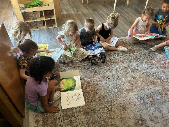 children looking at books