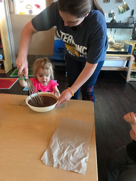 Child whisking batter