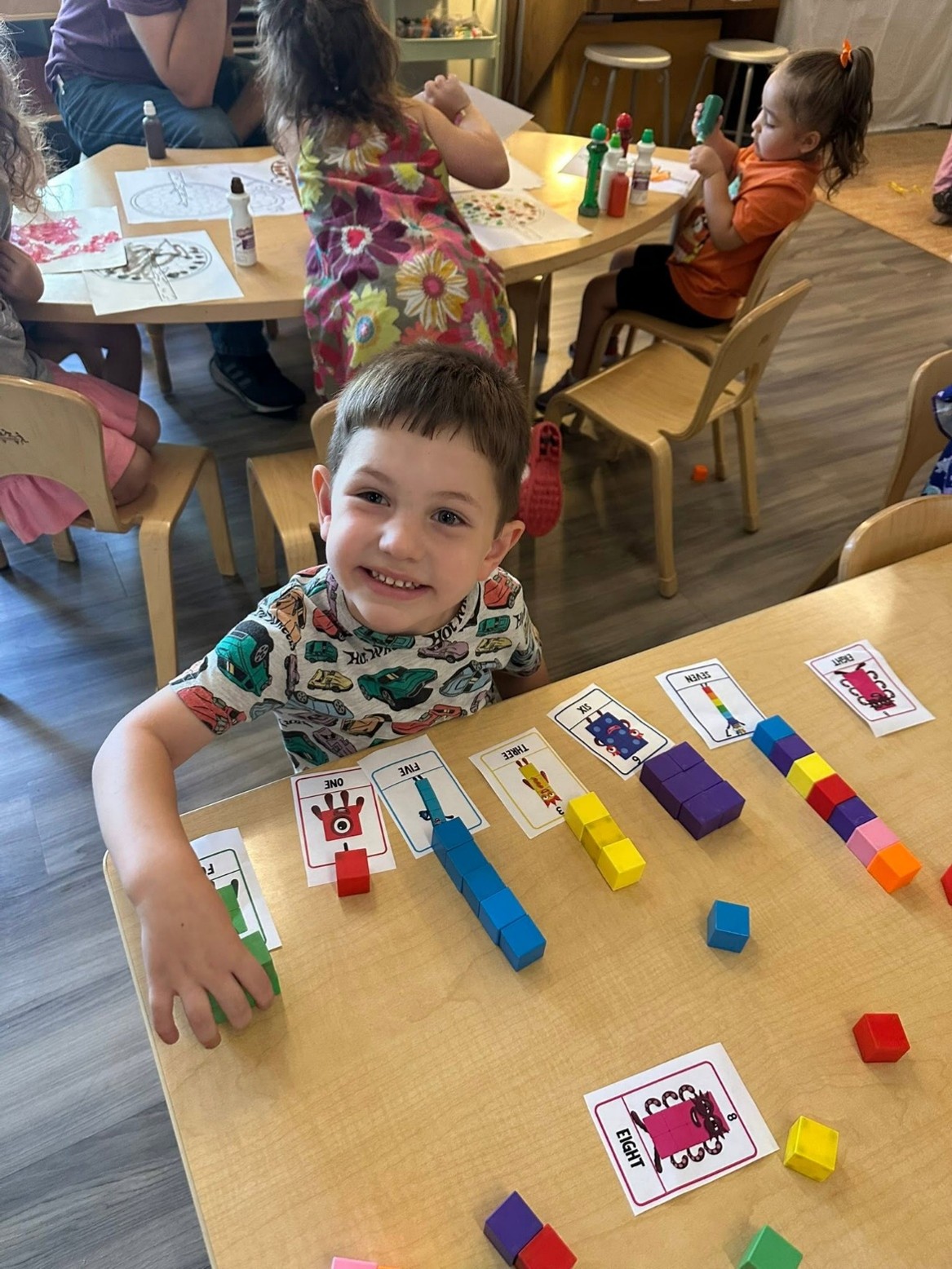 child counting blocks