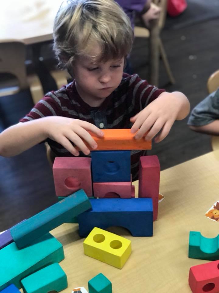 Child playing with blocks