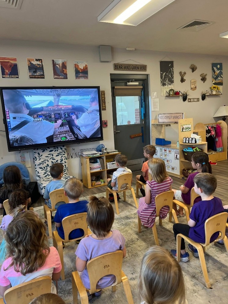 children looking at a screen