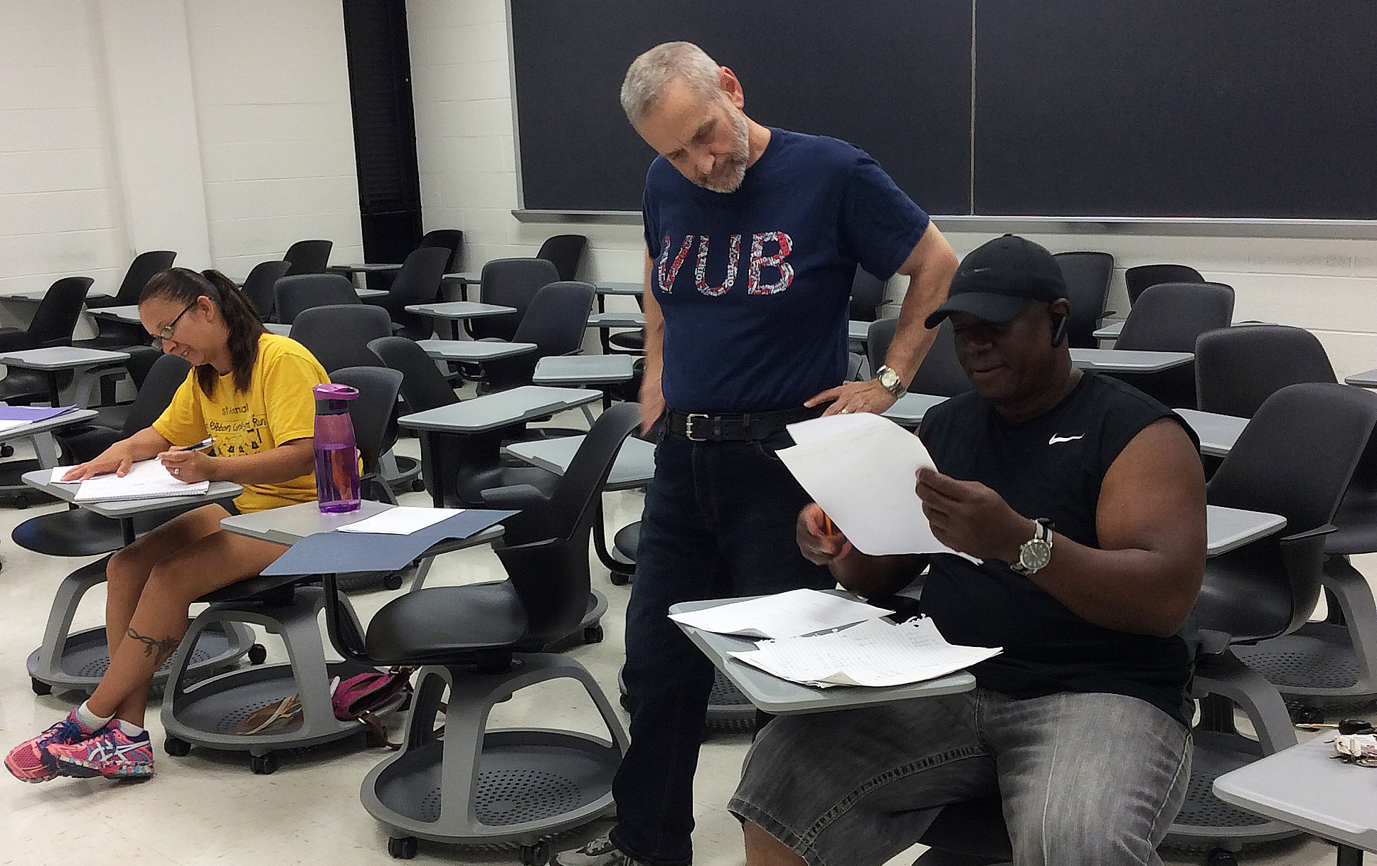 veteran student getting tutored in the classroom