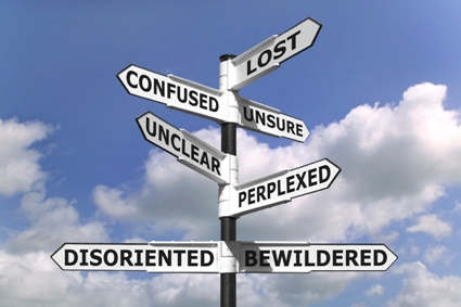 Signs pointing unhelpfully in multiple directions