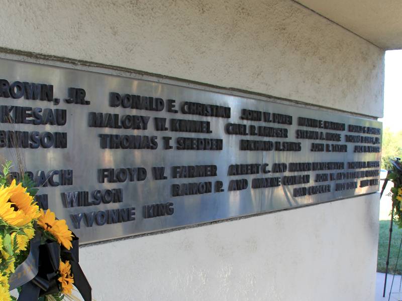 Memorial with wreaths.