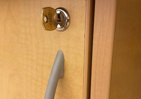 C390A Key in lock on the lectern or media cabinet