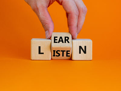 Blocks with the words "listen" and "learn"