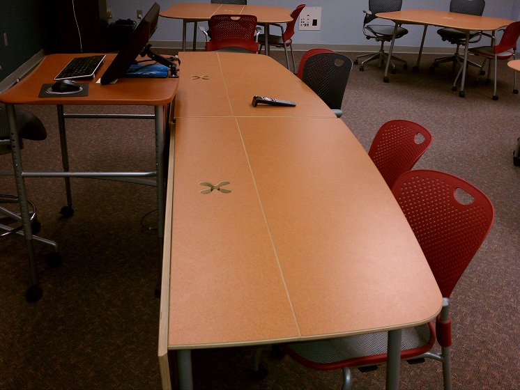 Butterfly tables (one side can be folded down if not desired)