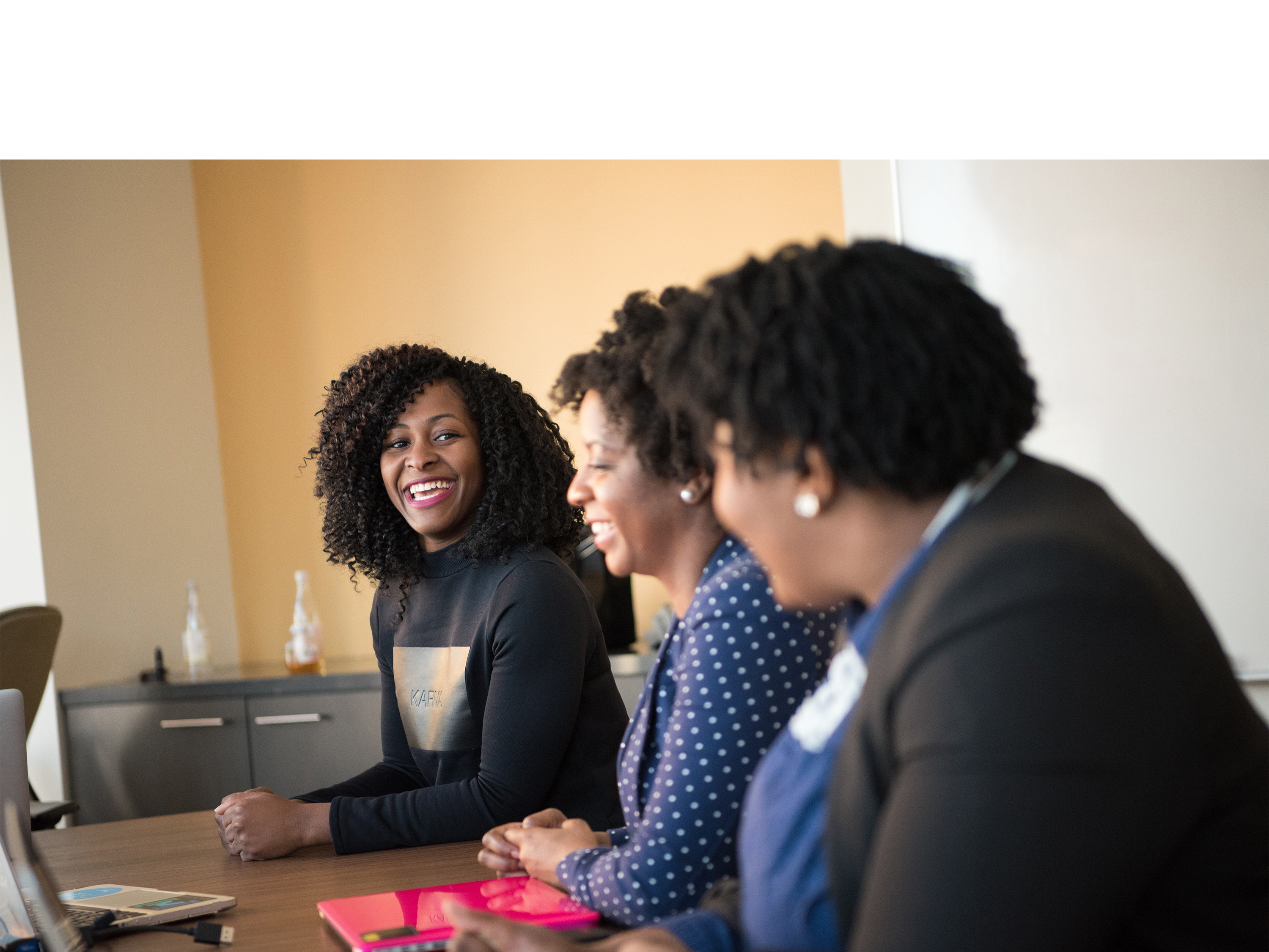one woman helping others at work