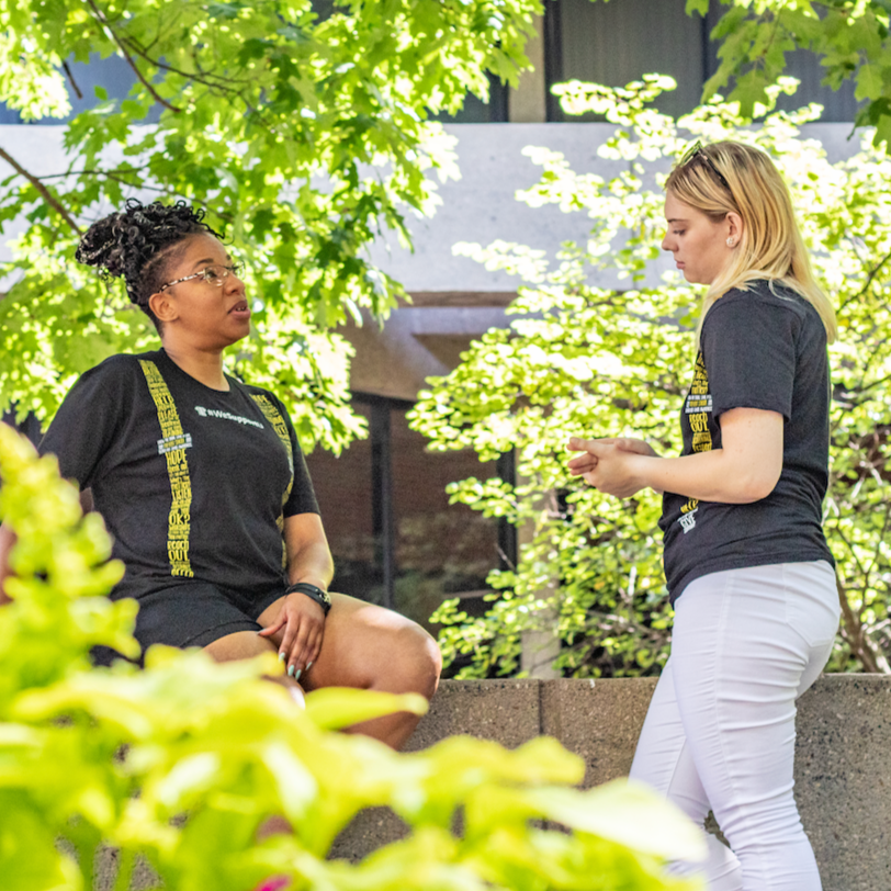 two females talking