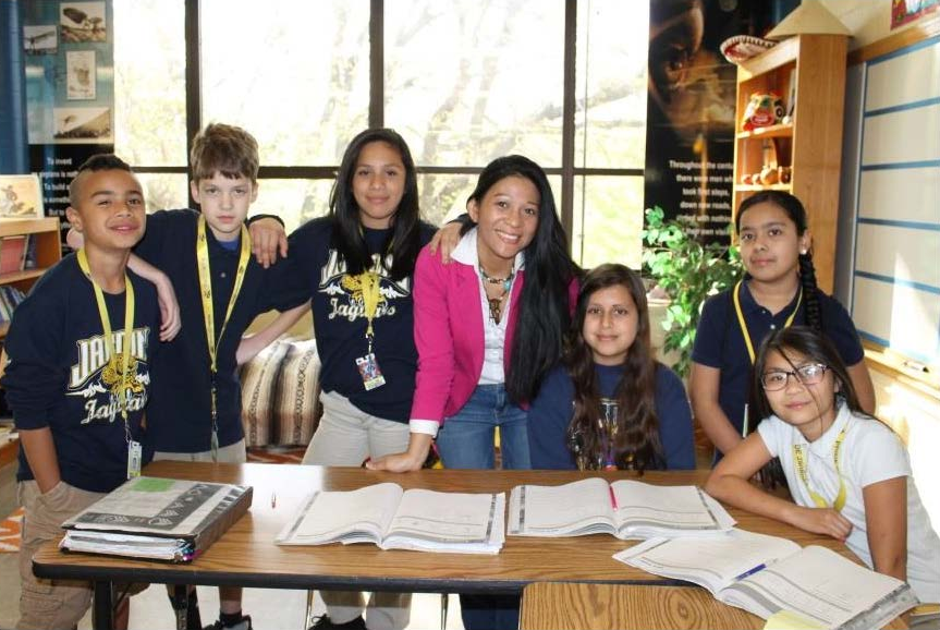 Photo of Sanata Souriya with a number of her students. 