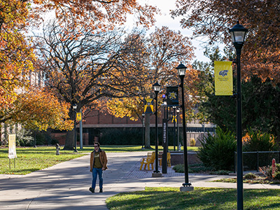 student walking on campus