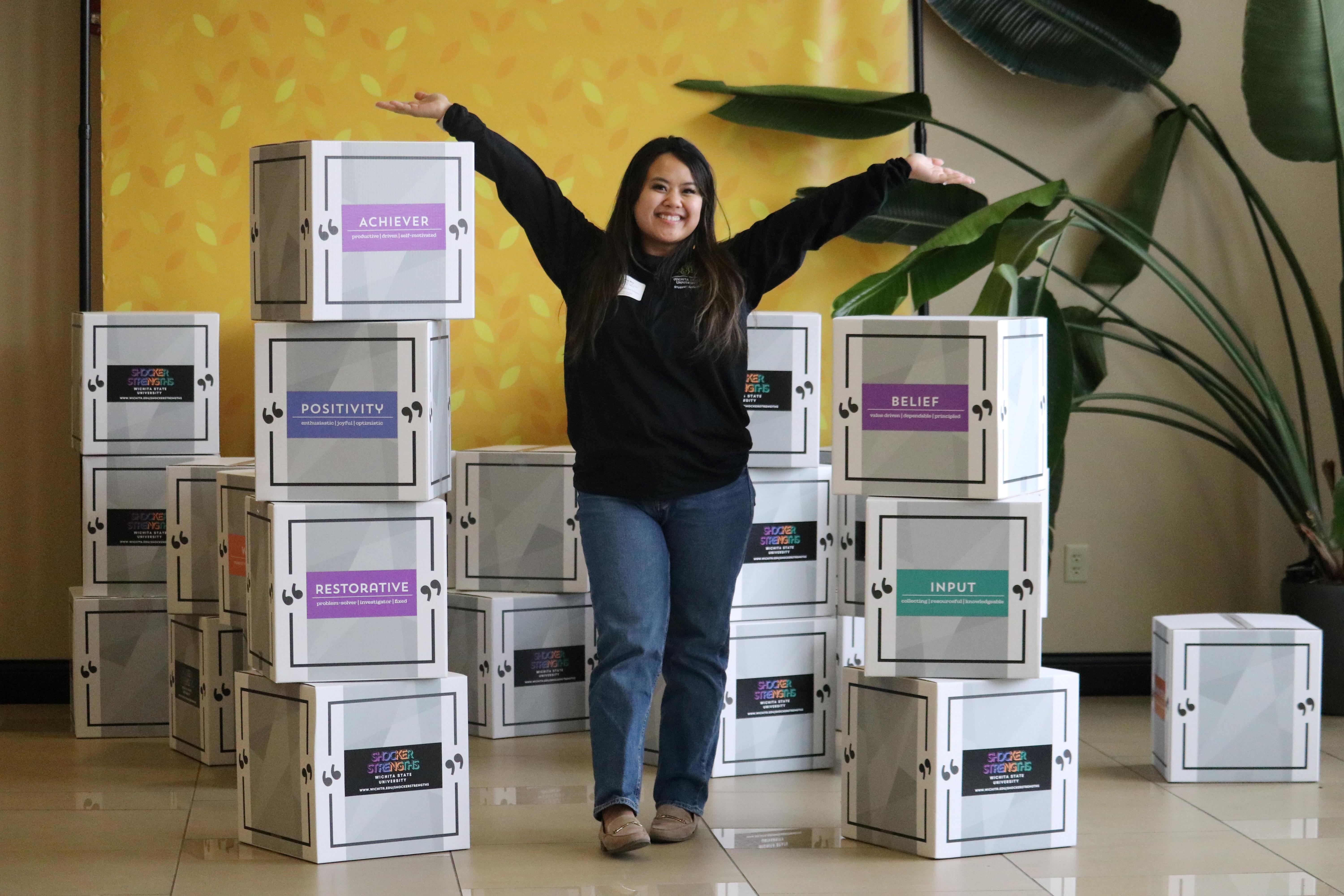 Girl with boxes labeled with Strengths