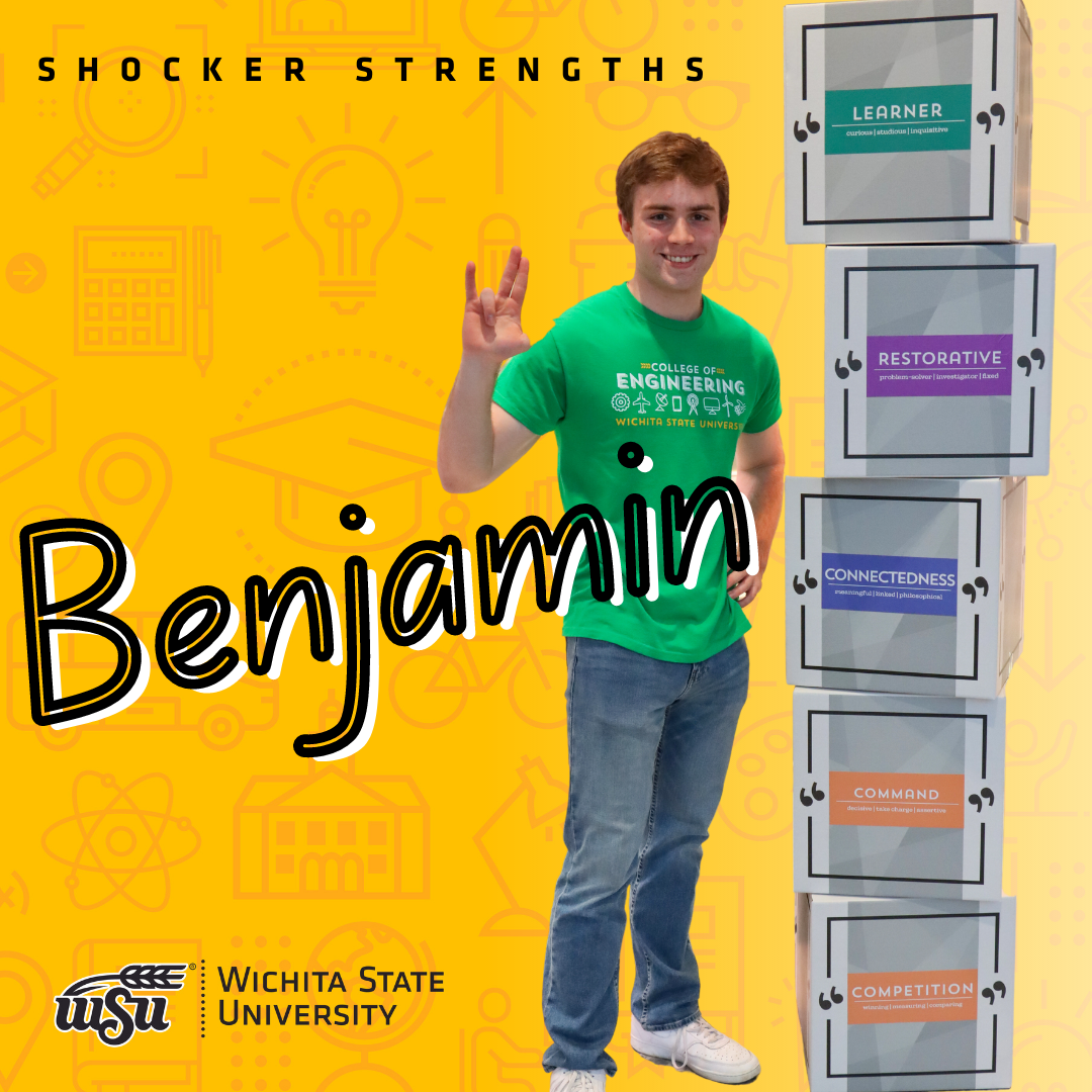 boy standing next to strengths boxes