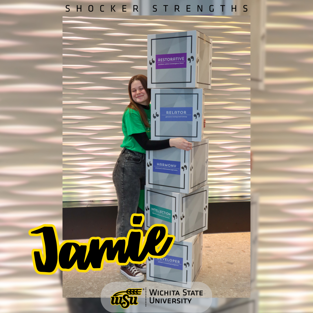 girl standing next to boxes