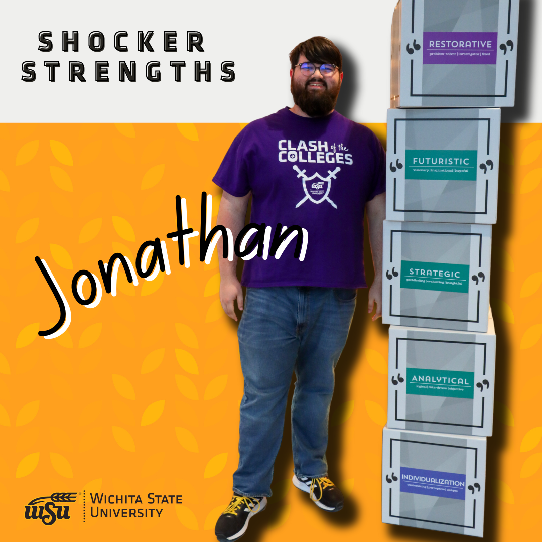 boy standing next to strengths boxes