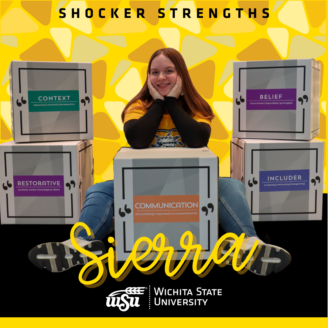 girl sitting next to boxes