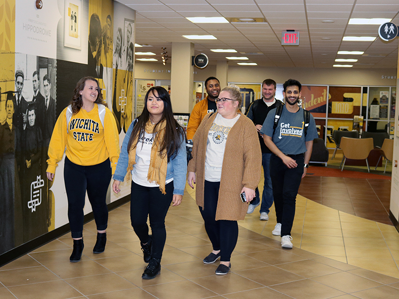 Grad students walking the RSC hallway