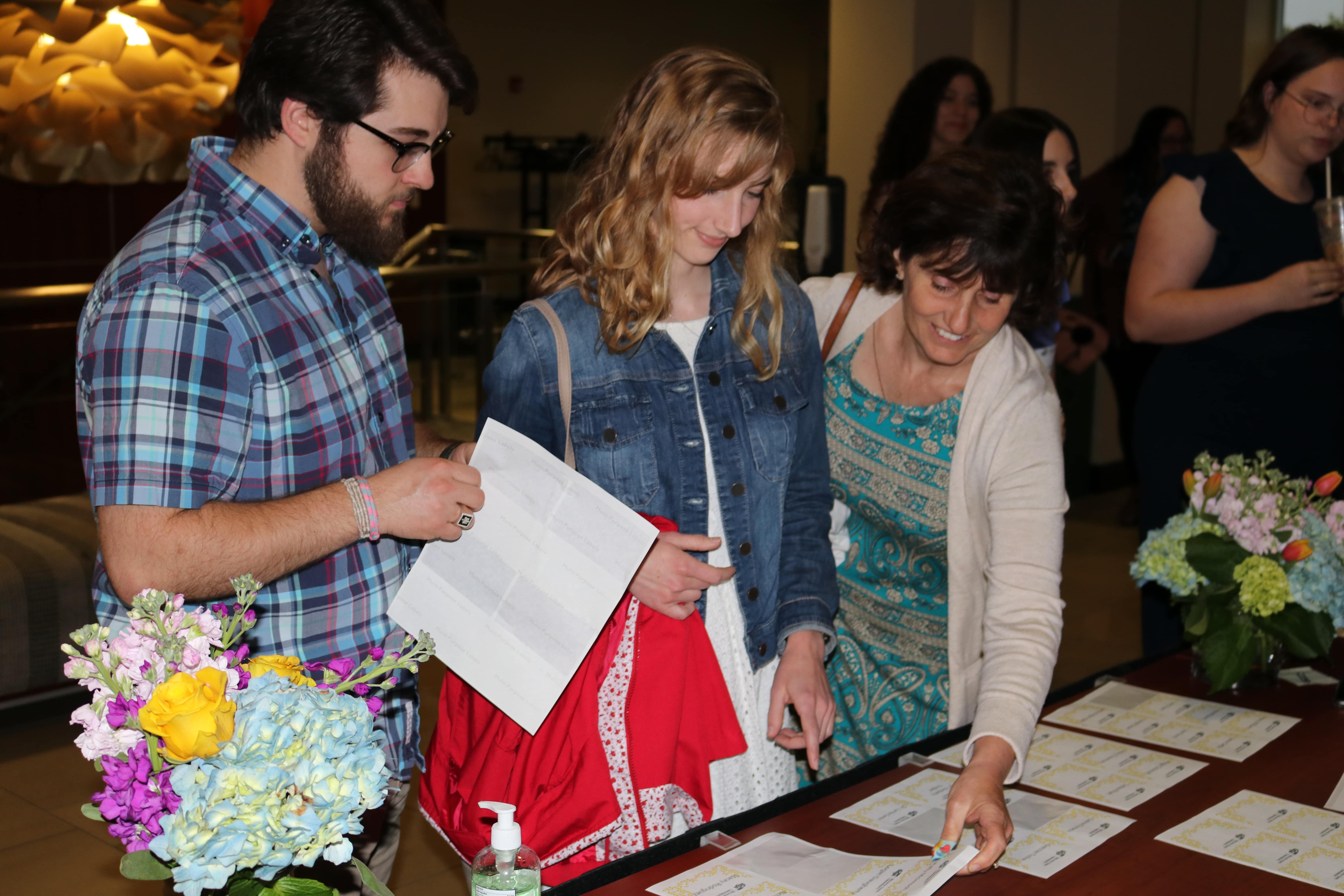 Guests checking in at the banquet