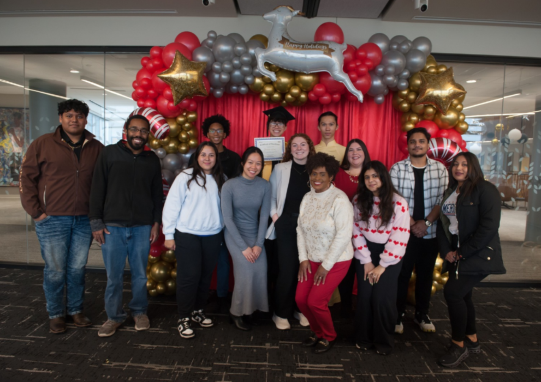 Picture of students with sss staff at graduation event