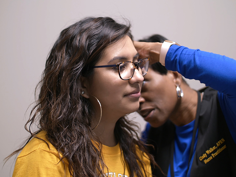 Cindy checking ears