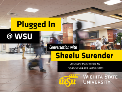 Picture of students walking in the student center on Wichita State's Campus
