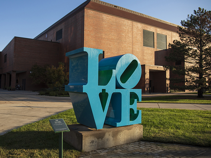 Photograph of the Beatles' "Love" statue present on campus. 