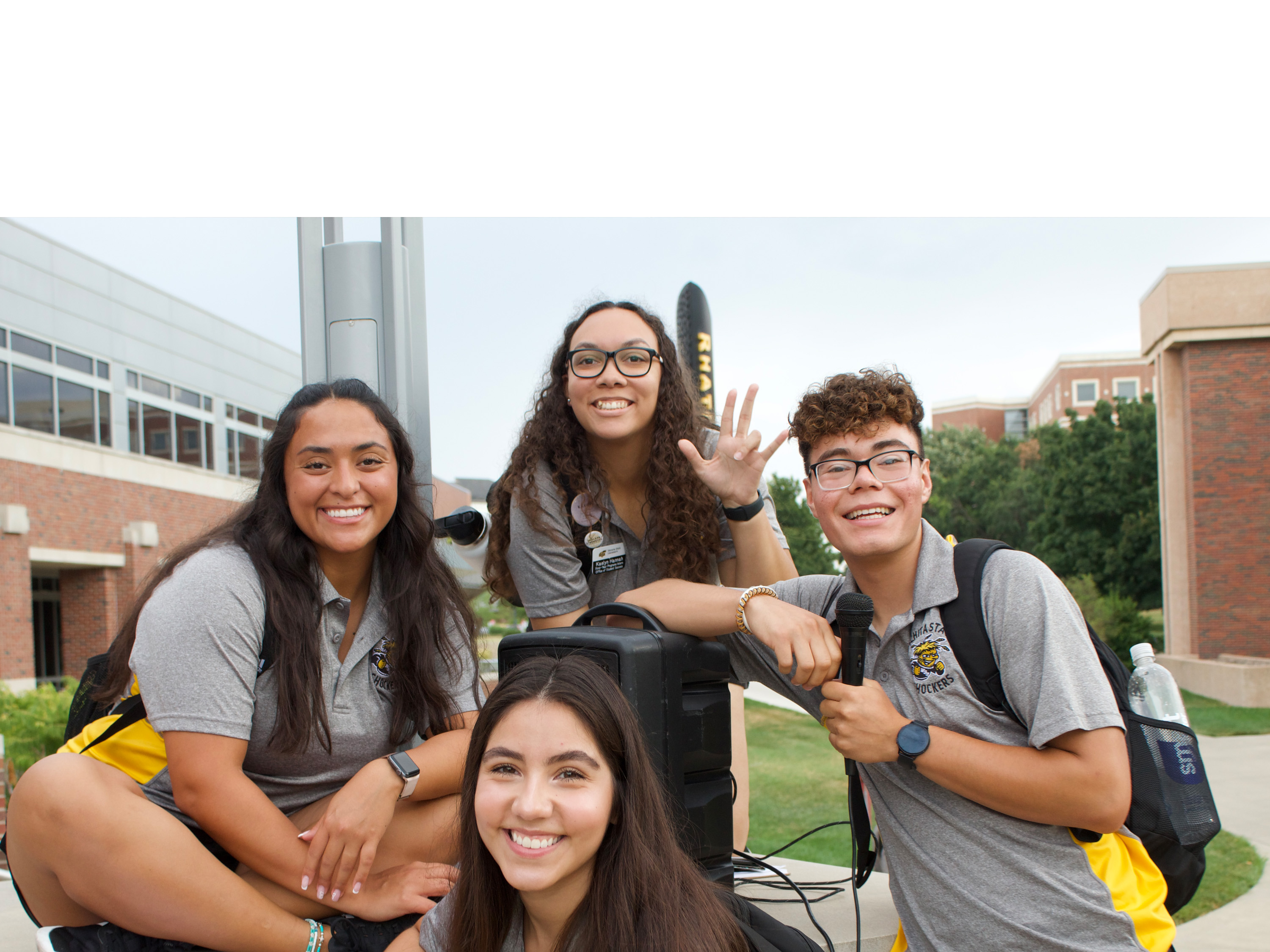 Transition Mentors smiling at camera during orientation.