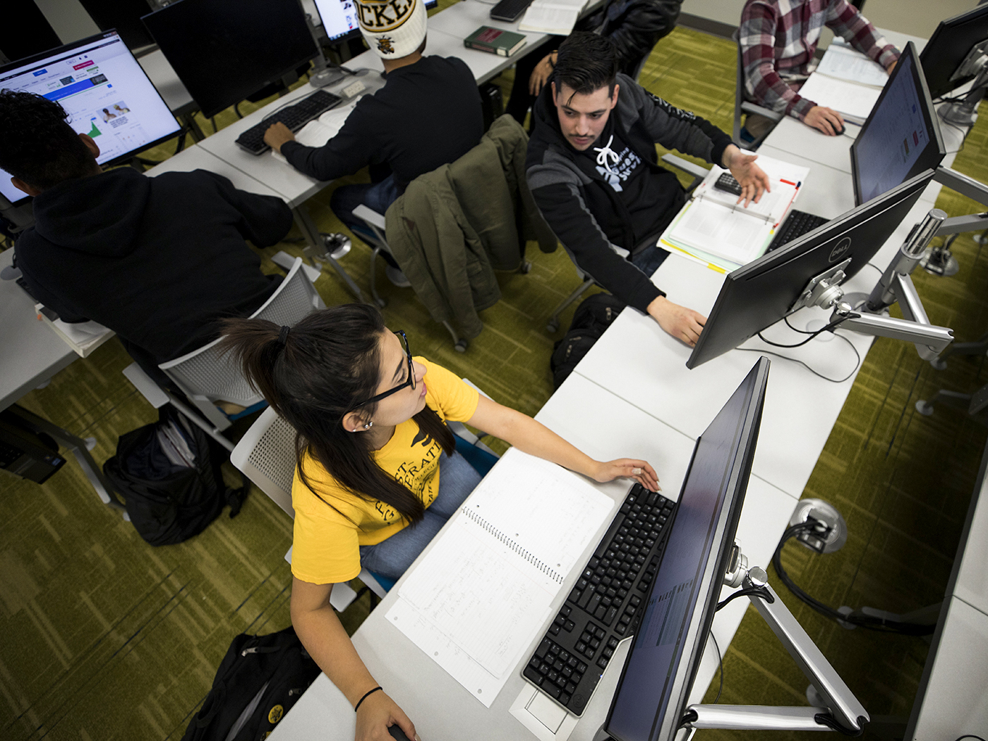 Hispanic students in a classroom on campus