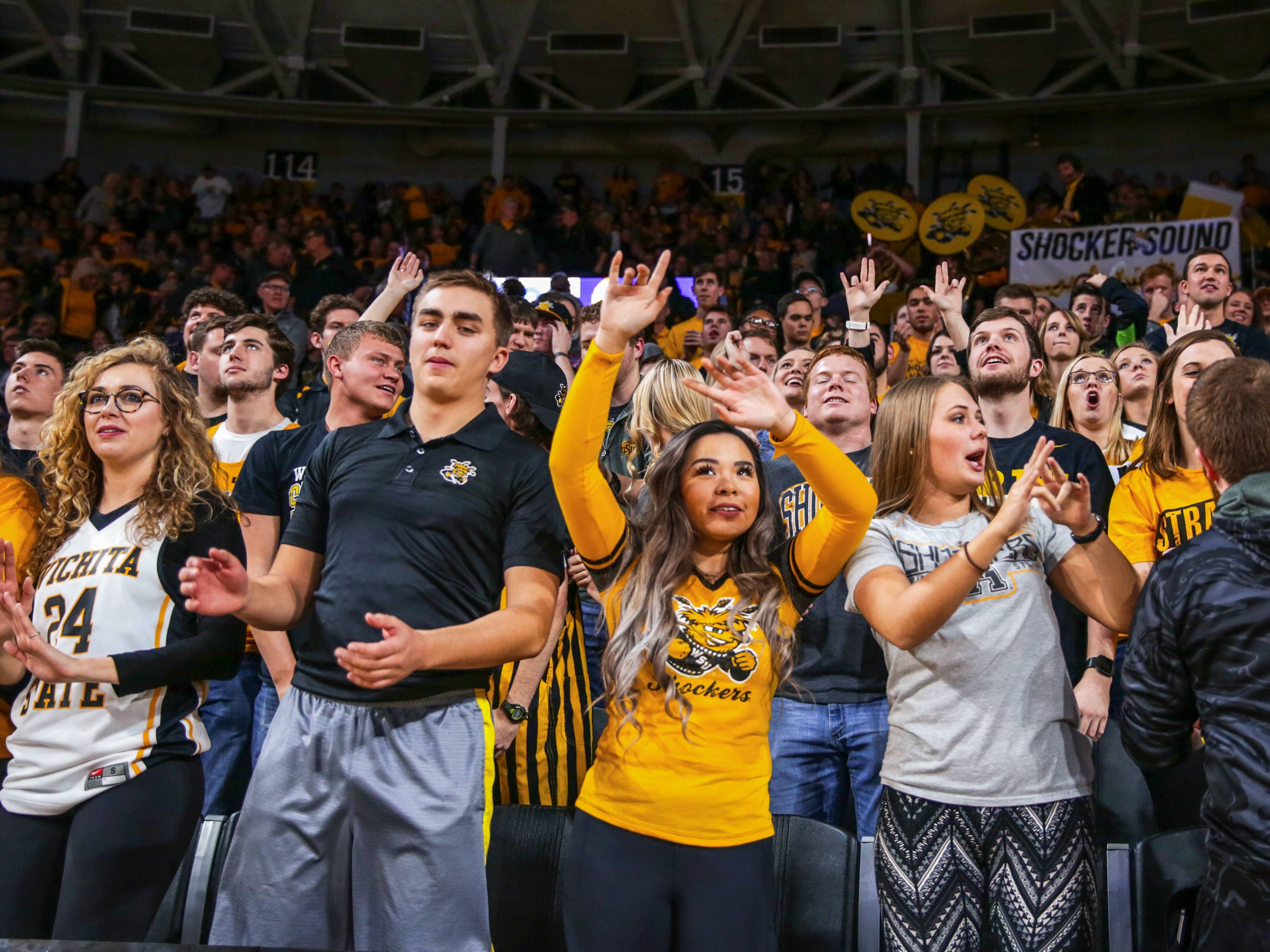 Shocker basketball fan cheering.