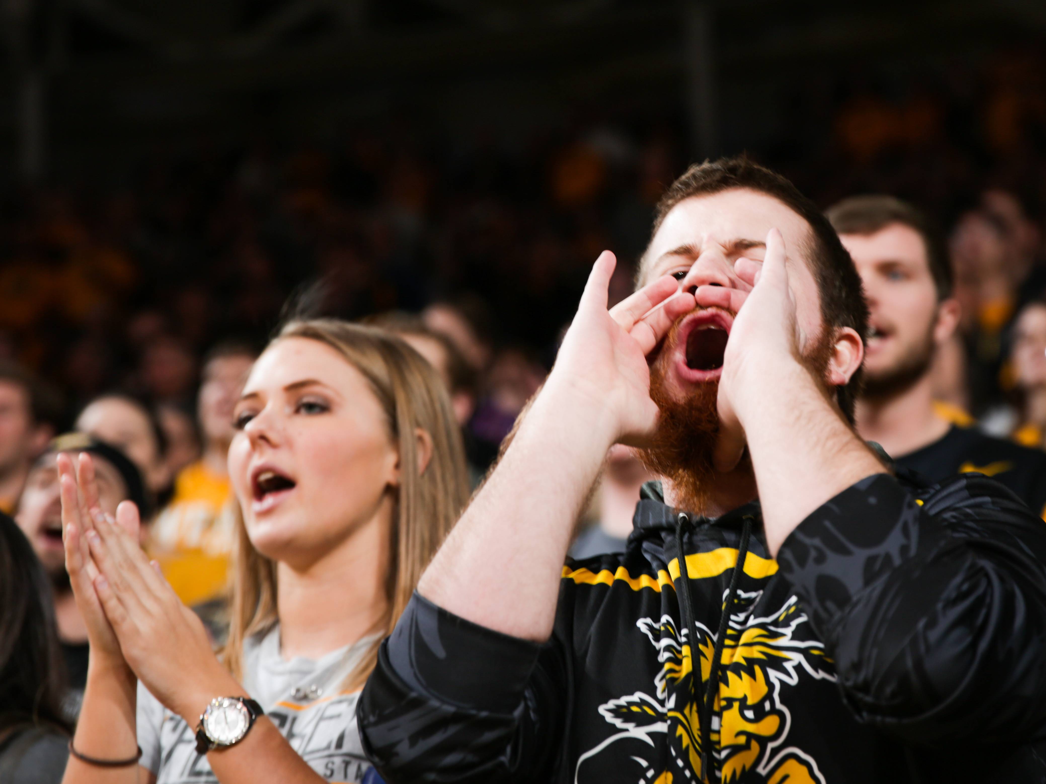 Shocker Basketball fans cheering.